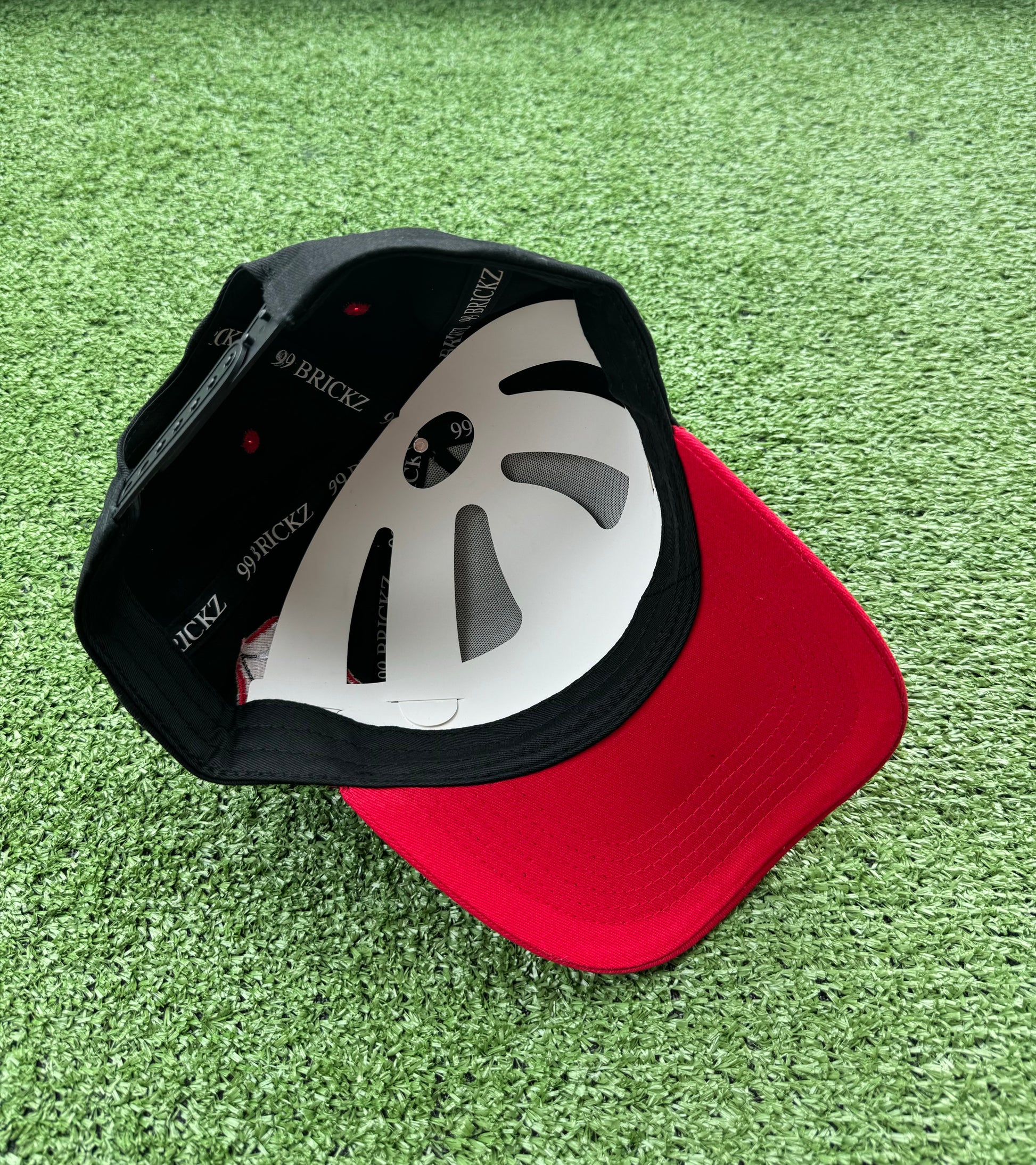 99 π
(Black/red)